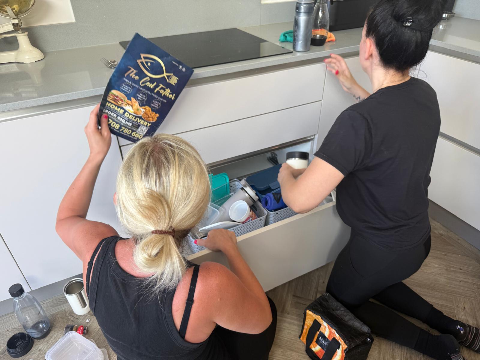 Home to Perfection organiser working alongside a client on a family lunchbox drawer